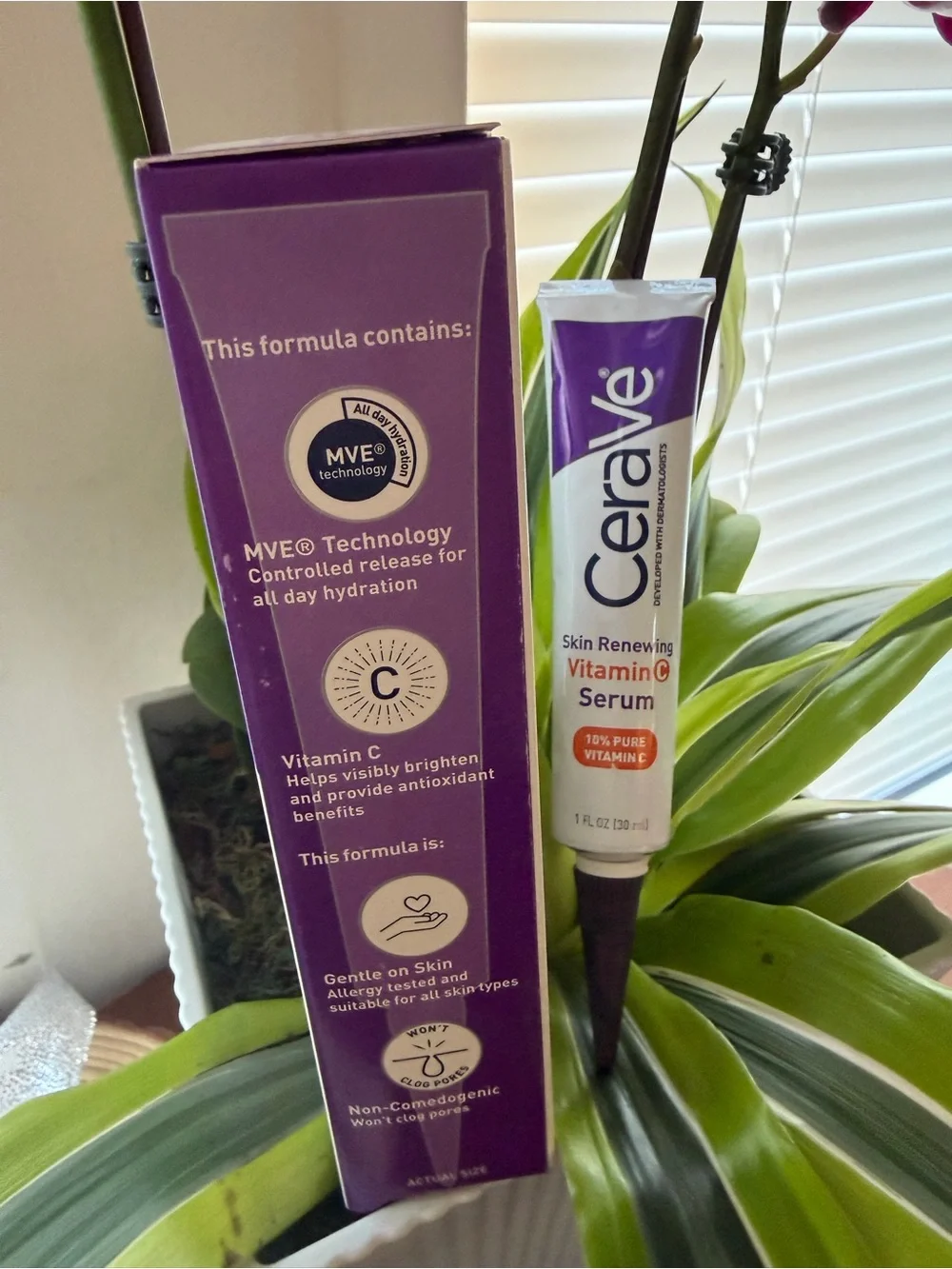 rave Vitamin C Serum Tube and Box in White and Purple